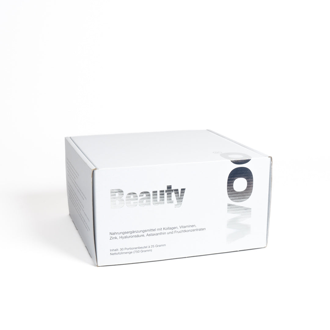 Weiße Verpackung mit "Beauty"-Aufschrift von Goldenbody Shop Ch, enthält Nahrungsergänzungsmittel.