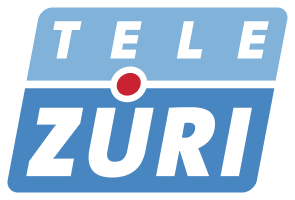 Das Tele Züri Logo in Blau und Weiß mit rotem Punkt ist abgebildet.